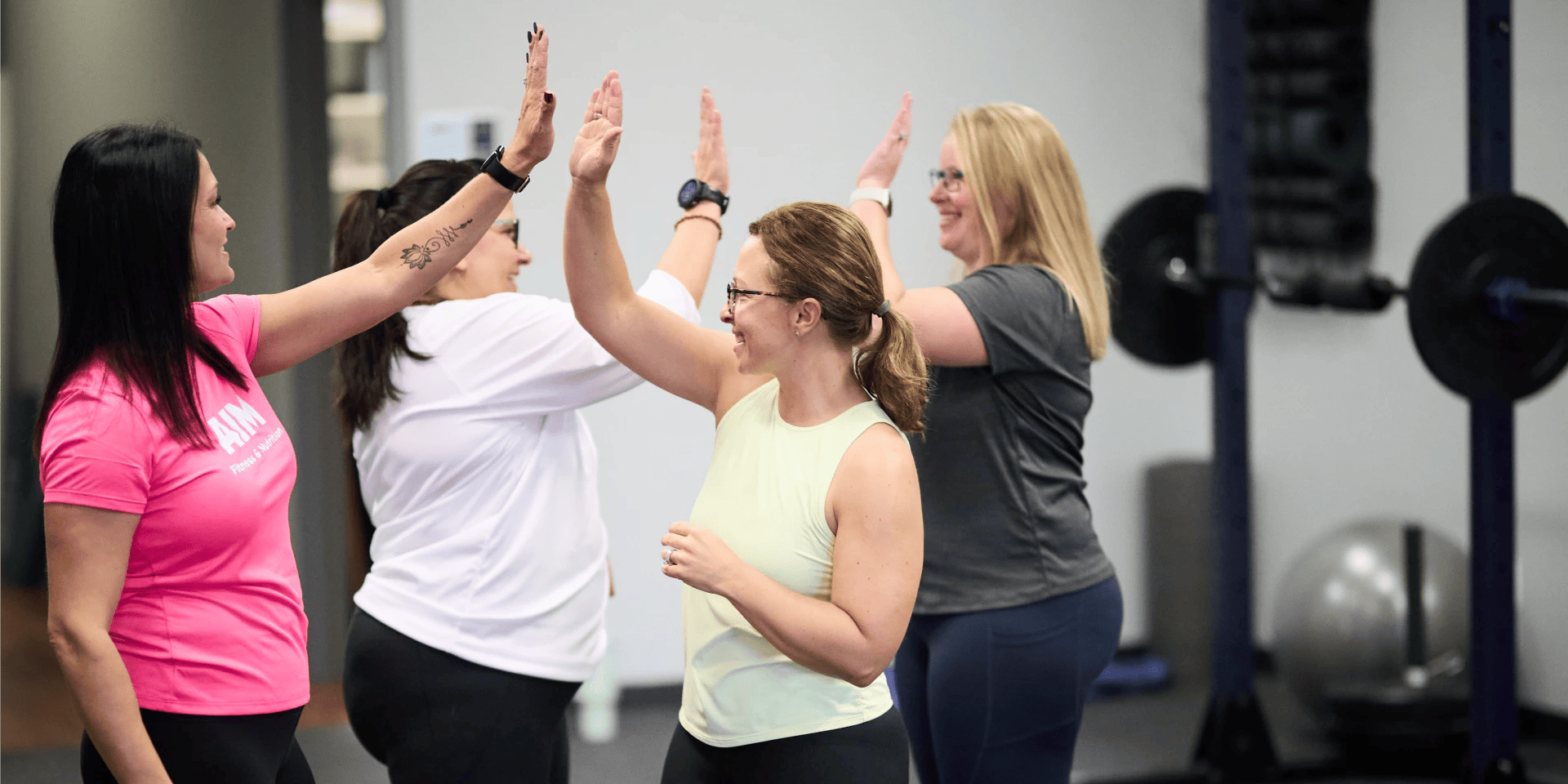 Group training at AIM Fitness and Nutrition. home gym vs gym